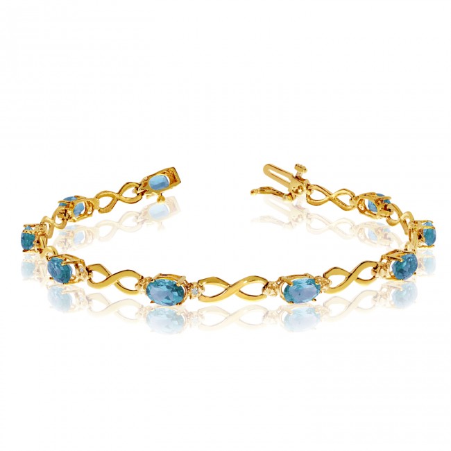 10K Yellow Gold Oval Blue Topaz and Diamond Bracelet