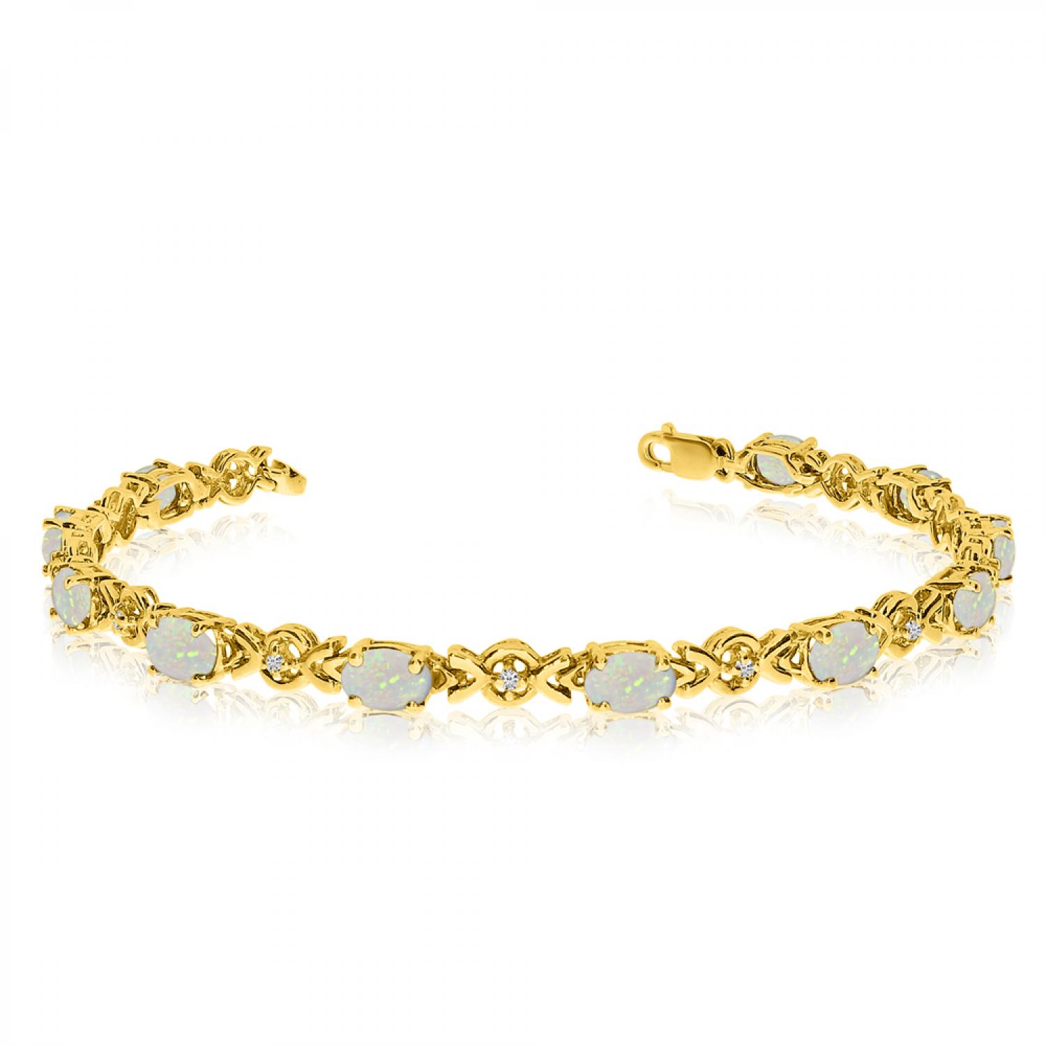 10K Yellow Gold Oval Blue Topaz and Diamond Bracelet