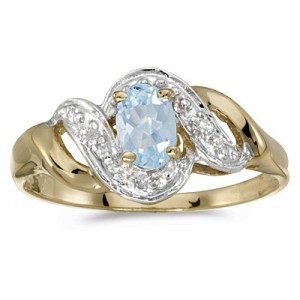 10k Yellow Gold Oval Aquamarine And Diamond Swirl Ring
