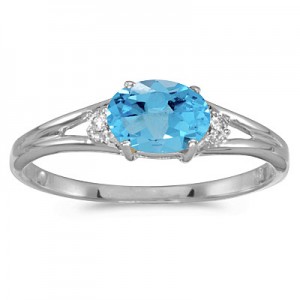 14k White Gold Oval Blue Topaz And Diamond Ring