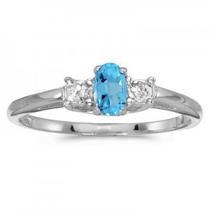 14K White Gold Oval Blue Topaz and diamond accent birthstone ring