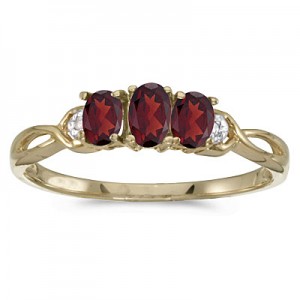 10k Yellow Gold Oval Garnet And Diamond Three Stone Ring