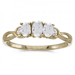 10k Yellow Gold Oval White Topaz And Diamond Three Stone Ring