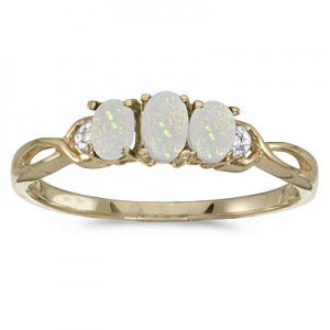 10k Yellow Gold Oval Opal And Diamond Three Stone Ring