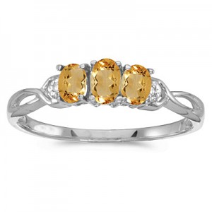 10k White Gold Oval Citrine And Diamond Three Stone Ring