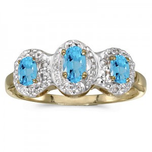 10k Yellow Gold Oval Blue Topaz And Diamond Three Stone Ring