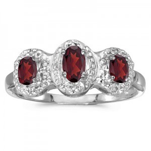 10k White Gold Oval Garnet And Diamond Three Stone Ring