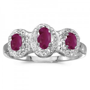 14k White Gold Oval Ruby And Diamond Three Stone Ring