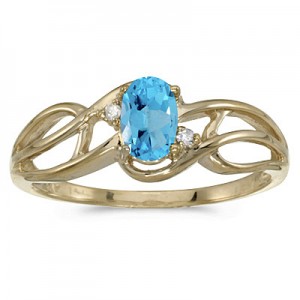 10k Yellow Gold Oval Blue Topaz And Diamond Curve Ring