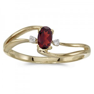 10k Yellow Gold Oval Garnet And Diamond Wave Ring