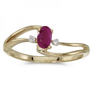 10k Yellow Gold Oval Ruby And Diamond Wave Ring