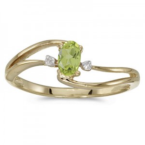 10k Yellow Gold Oval Peridot And Diamond Wave Ring