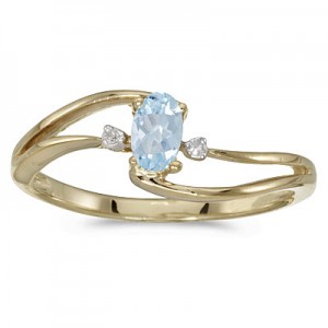 14k Yellow Gold Oval Aquamarine And Diamond Wave Ring