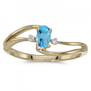 14k Yellow Gold Oval Blue Topaz And Diamond Wave Ring
