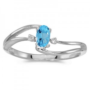 14k White Gold Oval Blue Topaz And Diamond Wave Ring
