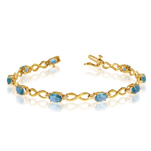 10K Yellow Gold Oval Blue Topaz and Diamond Bracelet