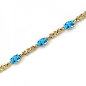 14K Yellow Gold Oval Blue Topaz and Diamond Bracelet