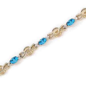 14K Yellow Gold Oval Blue Topaz and Diamond Bracelet