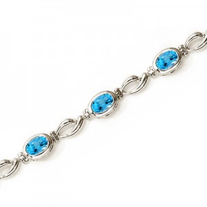 14K White Gold Oval Blue Topaz Bracelet