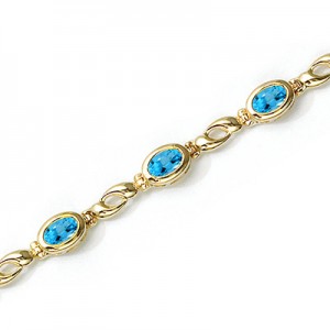 14K Yellow Gold Oval Blue Topaz Bracelet