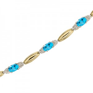 14K Yellow Gold Oval Blue Topaz and Diamond Bracelet