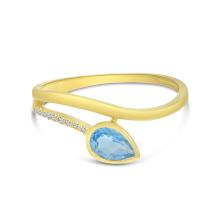 14K Yellow Gold Pear Blue Topaz and Diamond Wave Bypass Ring