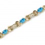 14K Yellow Gold Oval Blue Topaz and Diamond Bracelet