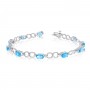 10K White Gold Oval Blue Topaz and Diamond Bracelet