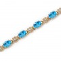 14K Yellow Gold Oval Blue Topaz and Diamond Bracelet