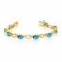 14K Yellow Gold Oval Blue Topaz and Diamond Bracelet