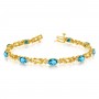 14K Yellow Gold Oval Blue Topaz and Diamond Bracelet