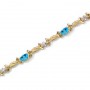 14K Yellow Gold Oval Blue Topaz and Diamond Bracelet