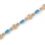 14K Yellow Gold Oval Blue Topaz and Diamond Bracelet