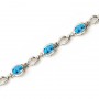 14K White Gold Oval Blue Topaz Bracelet