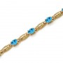 14K Yellow Gold Oval Blue Topaz Bracelet