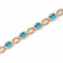 14K Yellow Gold Oval Blue Topaz Bracelet