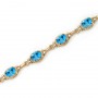 14K Yellow Gold Oval Blue Topaz Bracelet