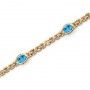 14K Yellow Gold Oval Blue Topaz Bracelet